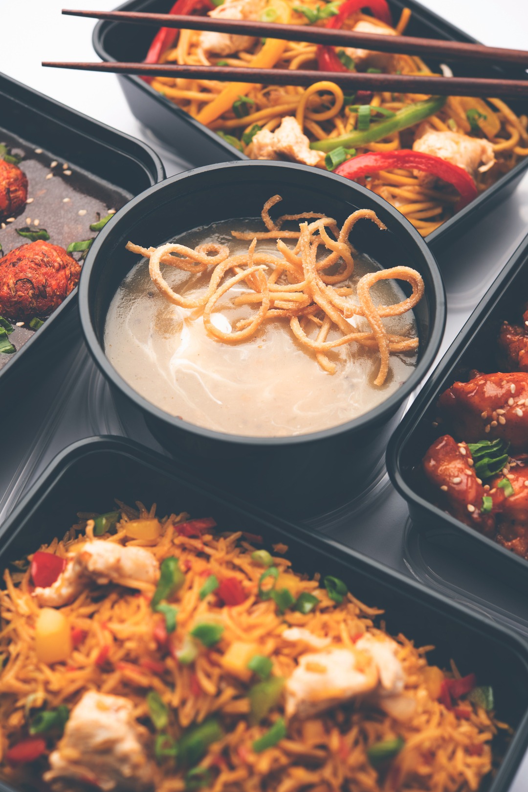 home-delivery-of-indian-chinese-food-in-plastic-bo-2023-11-27-05-36-53-utc (1)